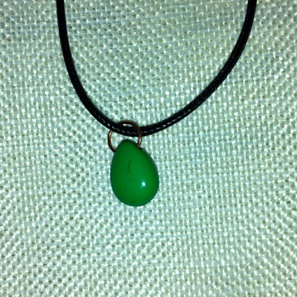 Pretty green moon necklace.